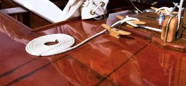 Varnish applied to the deck of a wooden vessel